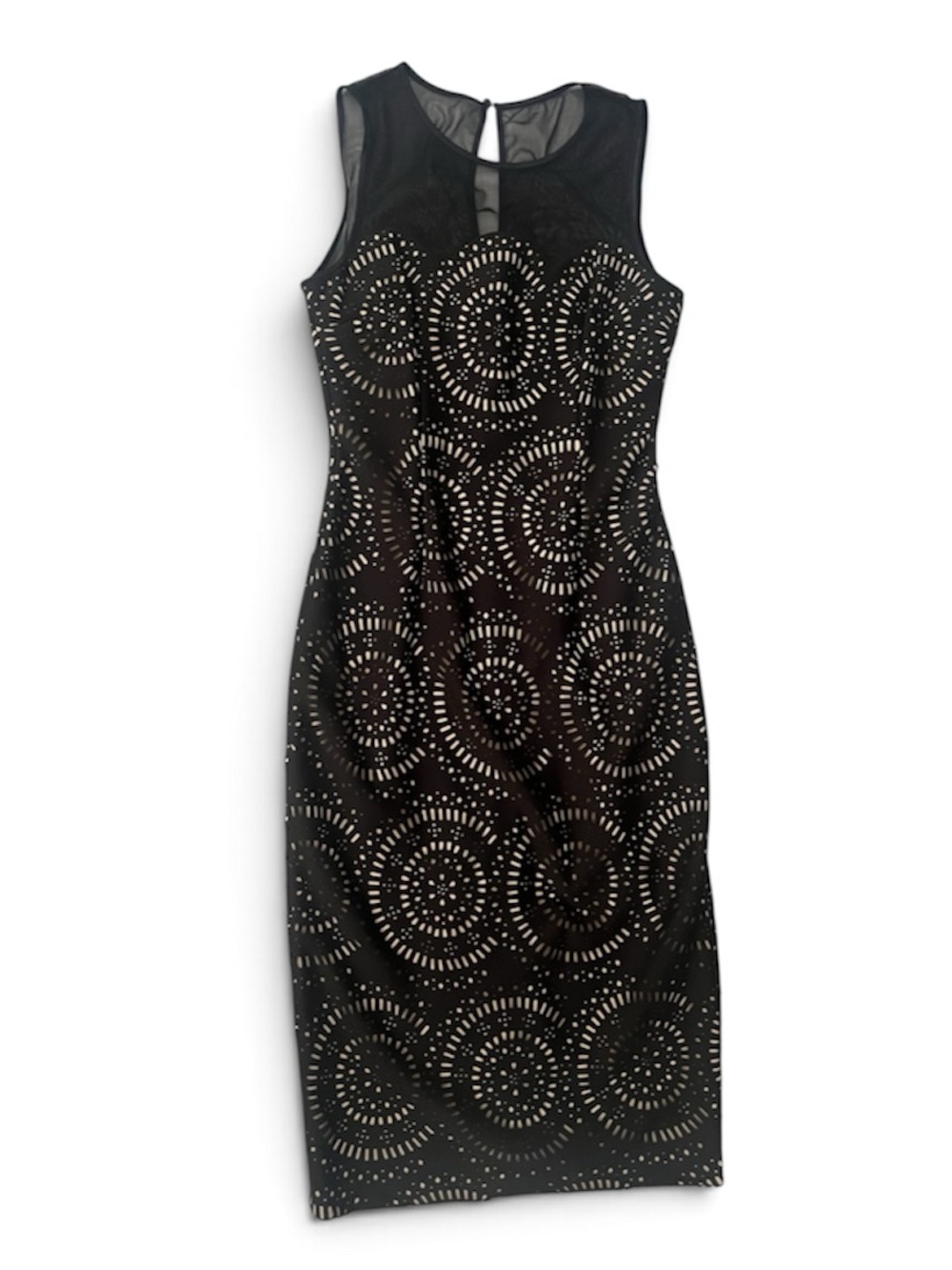 Maggie London black sleath dress with geometric pattern overlayed on nude lining